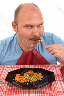 Eating his vegetables
