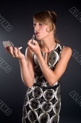 Touching up her make-up
