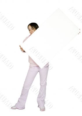 teen in pink holding banner