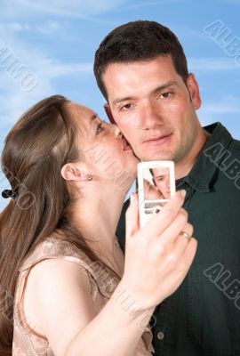 photo of a couple kissing