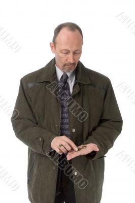 serious man counting coins