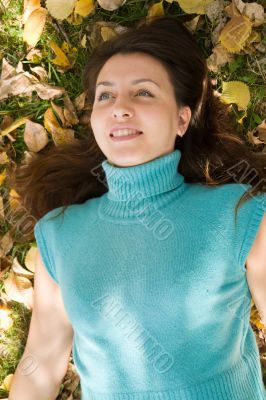 woman against yellow leaves