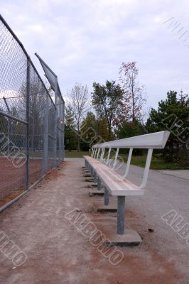Bench behind fence