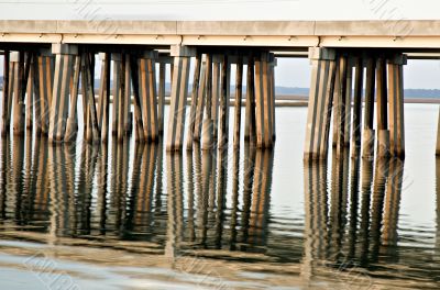 Bridge Supports Reflected in Water