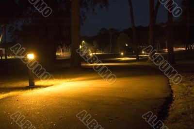 Lit Walking Path at Night