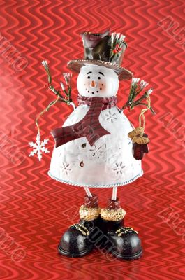 Snowman Sculpture with Red Background