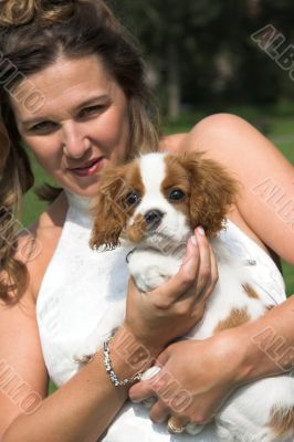 Woman with adorable cute puppy