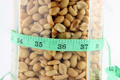 Peanuts in a Jar with Tape Measure
