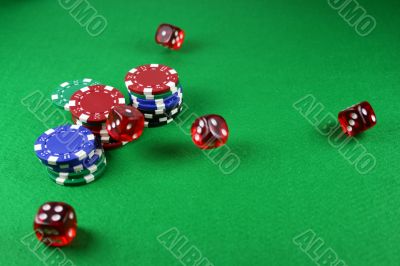 An Action shot of 5 dice thrown onto the table