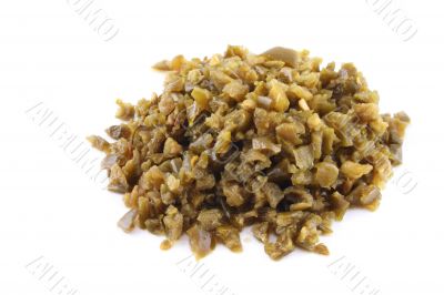 Green chopped chilies on an isolated background