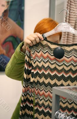 woman in Clothes shop