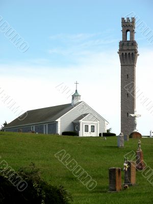 Church with bell tower on hill