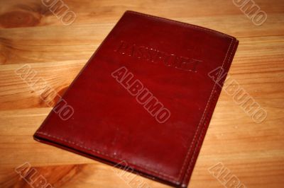 pasport in cover on table