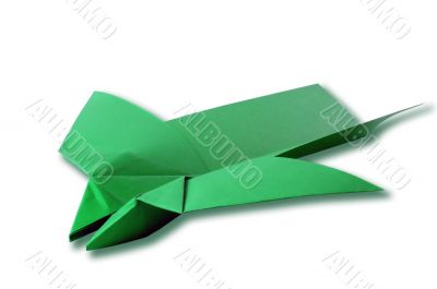 Green paper airplane isolated on a white background.