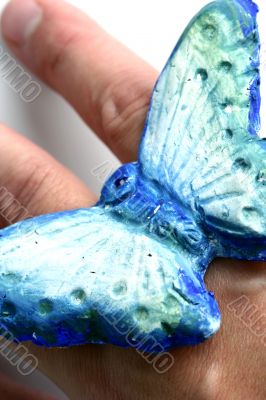 Butterfly in hand isolated