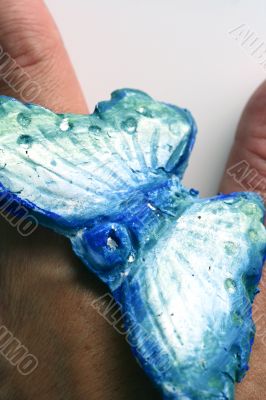 Butterfly in hand isolated
