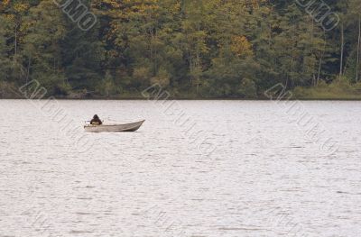 Fisherman On Lake