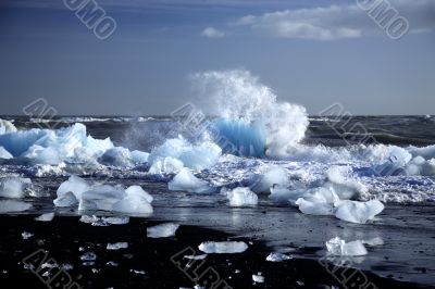 An iceberg being broken by the waves