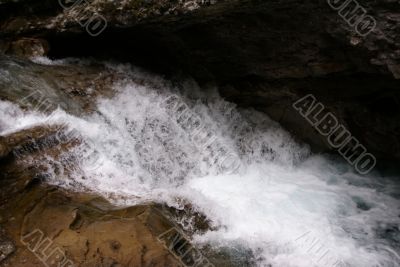 Detail, waterfalls in narrow canyon