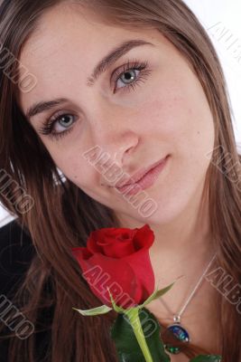 woman and rose on white