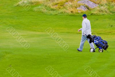 Golfer walking