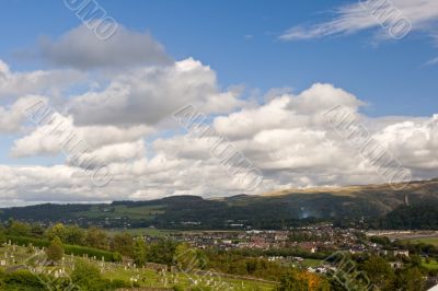 Stirling cemetery under a cloudy sky
