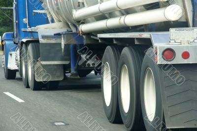 Blue semi truck with tanker