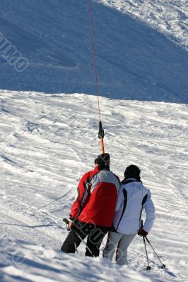 Two people in a skilift