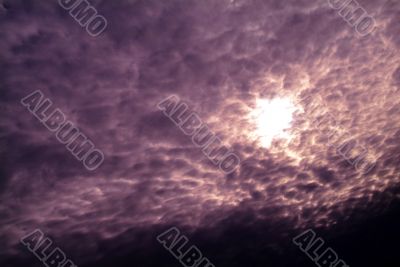 violet sky with clouds