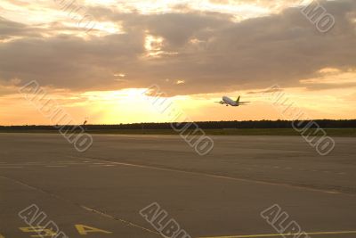 airplane setting of the sun