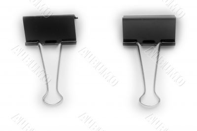 Two black metal clips