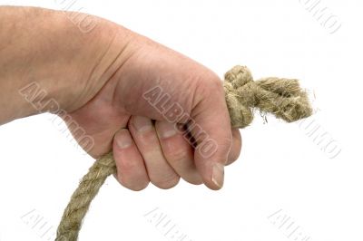Hand keeps rope with node