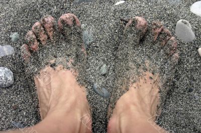 legs in sand