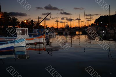 Color fish boat at night