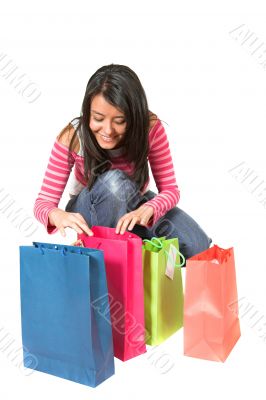 beautiful teenager with shopping bags