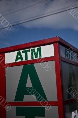 ATM machine in summer sun