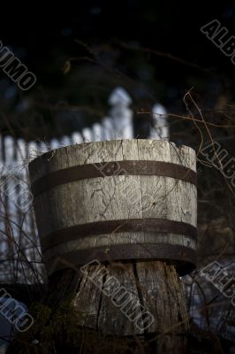 barrel and fence in early morning sun