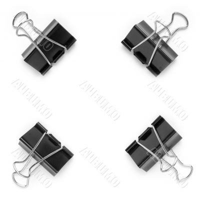 Four black metal clips