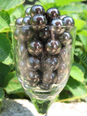 Metal balls in wine glass