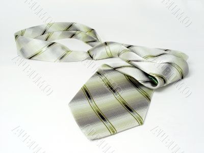 green isolated silk tie on the white background