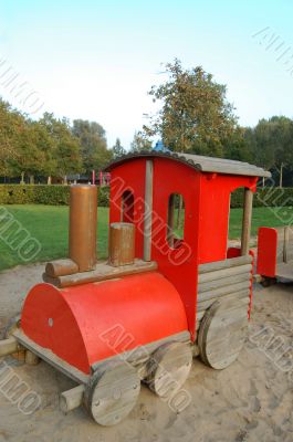 red train on sand