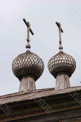 Two domes of ancient wooden church in north Russia