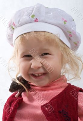 smiling baby with rat