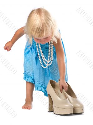 little girl with big shoes
