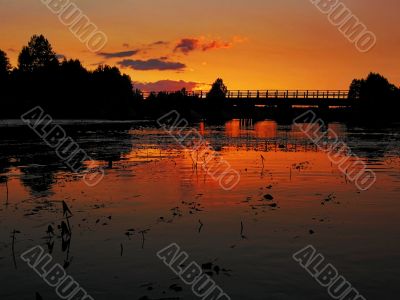 red sunset bridge