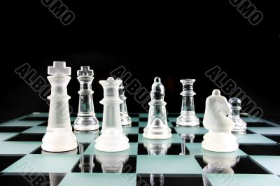 Chess Pieces on a glass board