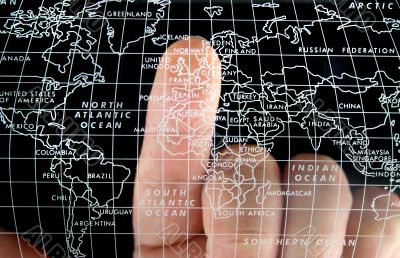 World Map finger pointing at UK