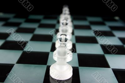 Chess Pieces on a glass board - Pawnage