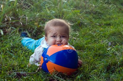 Timid baby with ball