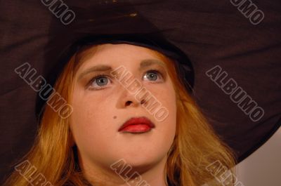 young girl as witch
